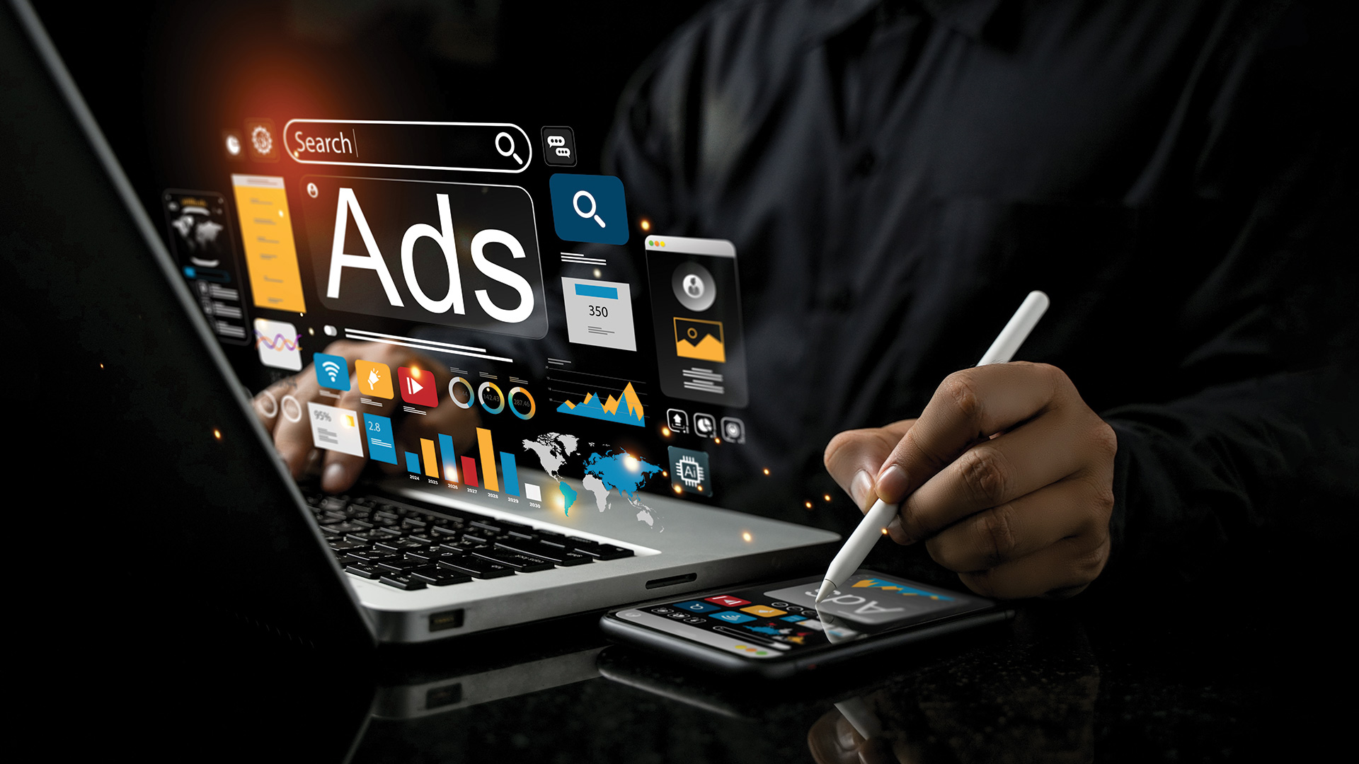 Person on a laptop and phone using a digital pen and holographic overlay of search ads and other marketing metrics